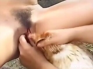 Big-boobed lady fucking a rather seductive dog